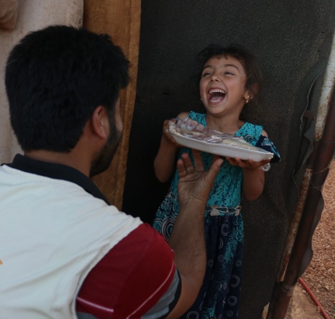 Food and water distribution for families in camps